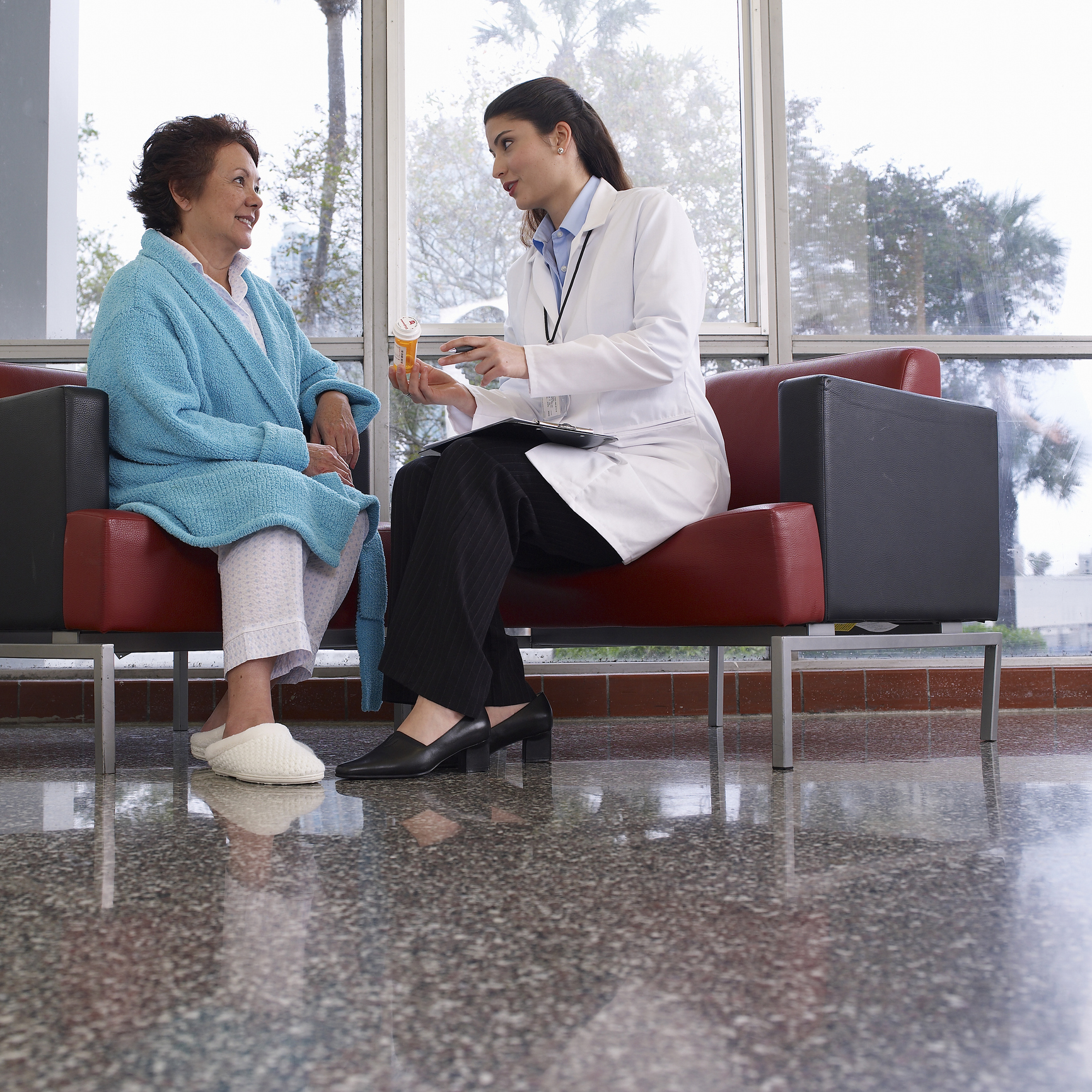 Healthcare professional talking to patient