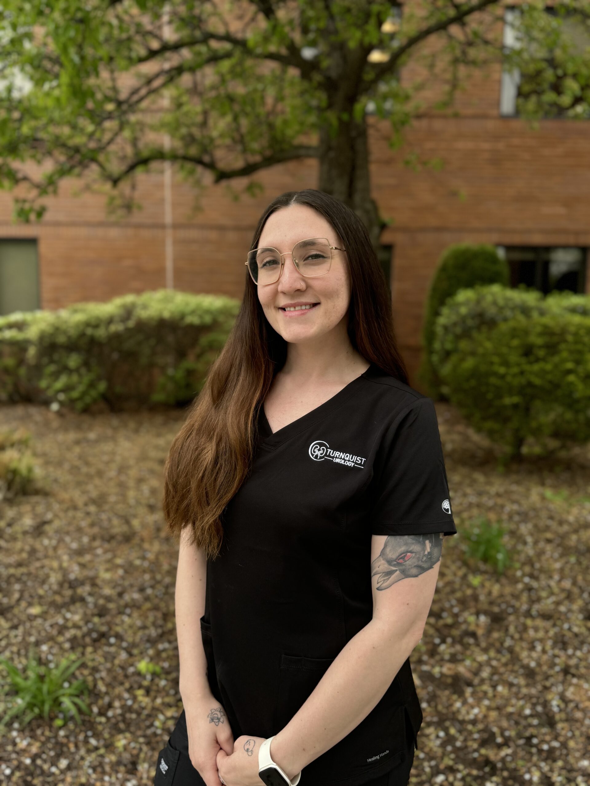 Healthcare worker posing outdoors