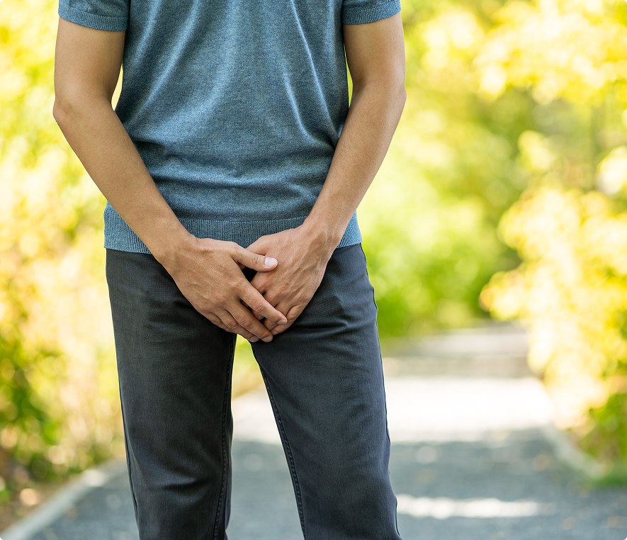Man standing on sunny path