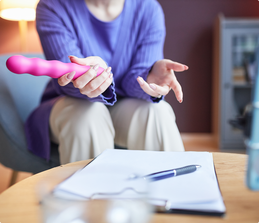 Informal meeting with pink object in hand