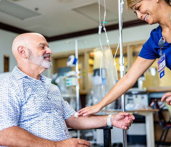 Nurse caring for seated patient