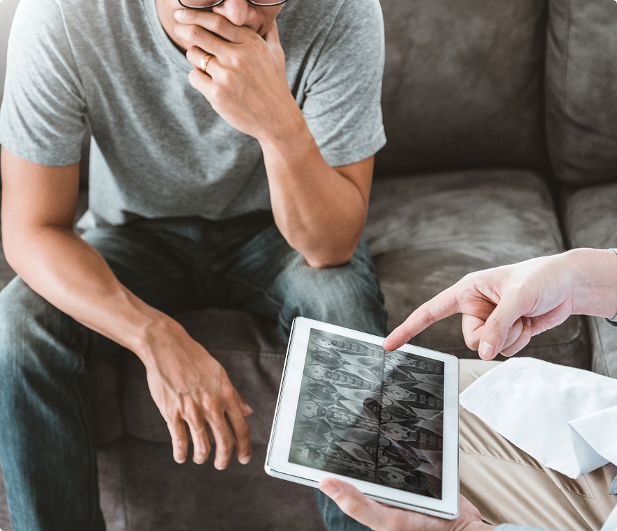 Therapist showing tablet to client